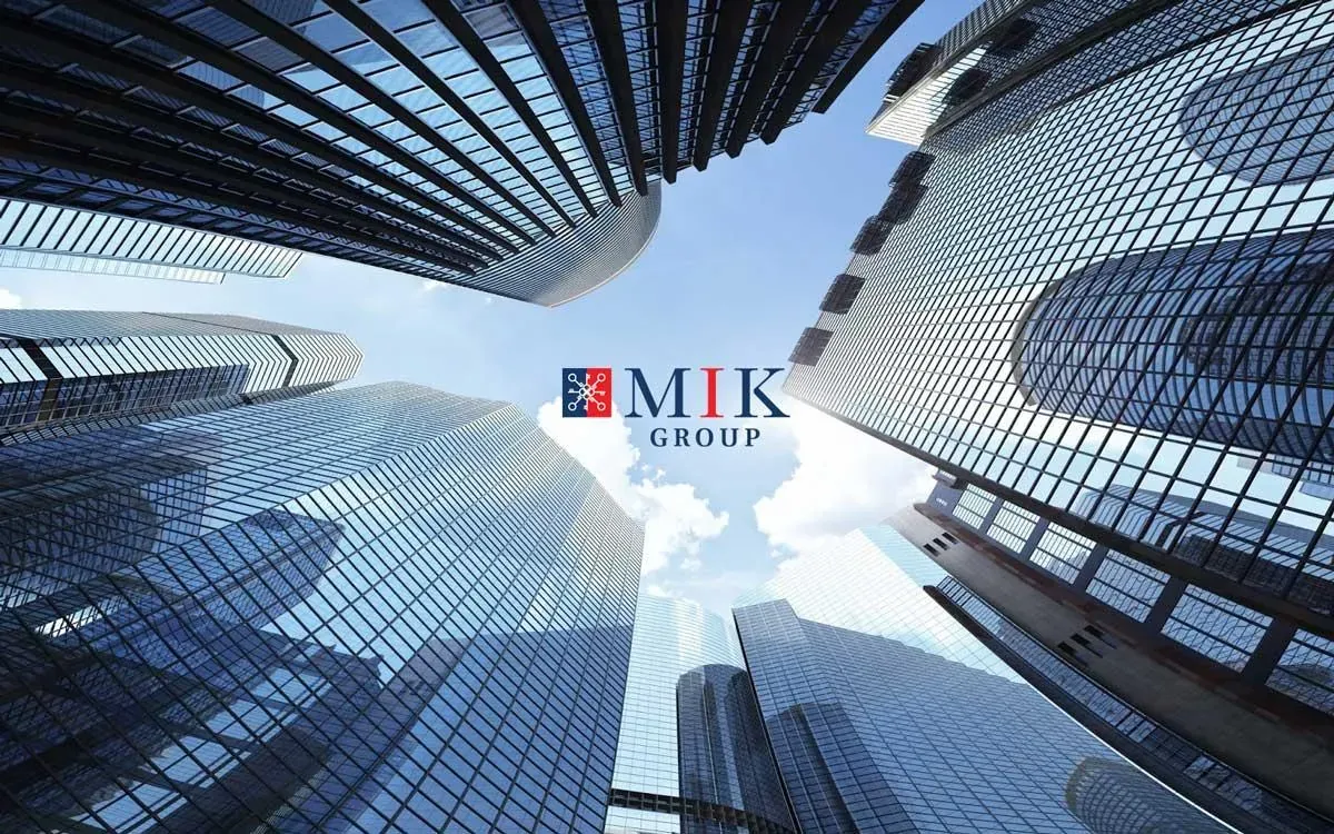 Hình ảnh nhận diện tập đoàn MIK Group với các khối cao ốc kính, nhà phát triển dòng sản phẩm căn hộ Imperia